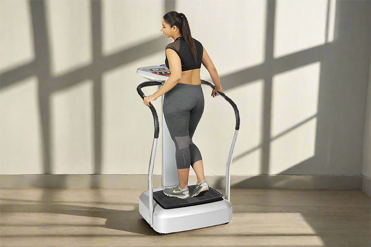 Girl stand on cross fit message machine